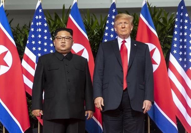 Donald_Trump_and_Kim_Jong-un_standing_next_to_each_other(cropped)